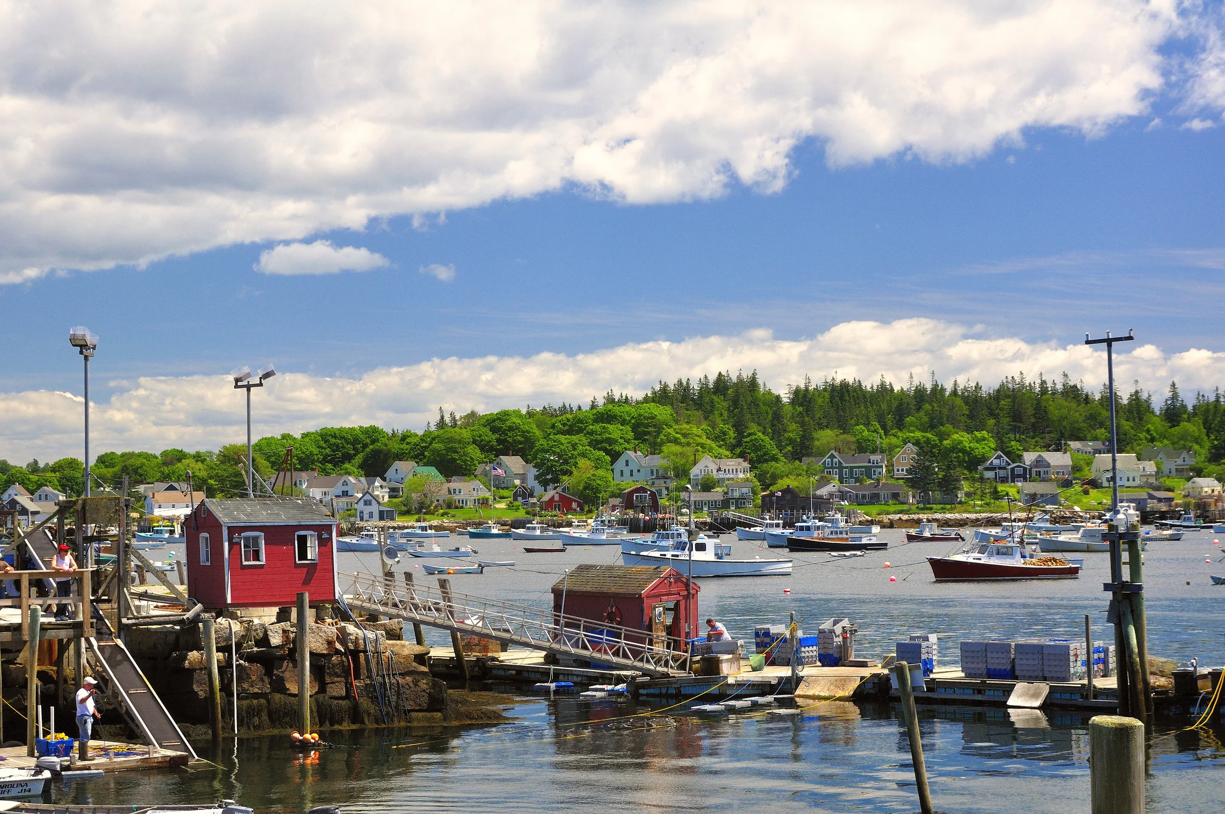 New England working waterfront with fishing vessels and gear